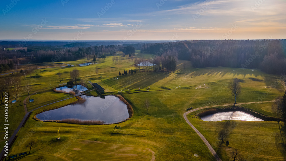 Fototapeta premium Aerial view of European centre golf course by drone