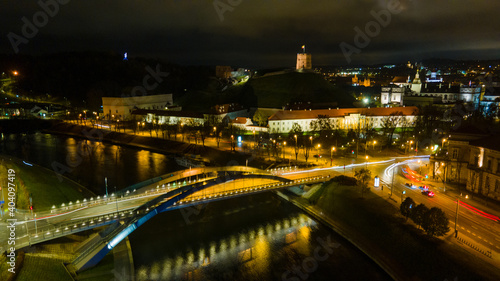 Aerial view of Vilnius old town at night by drone