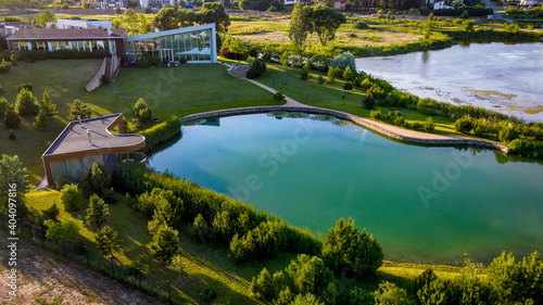 Aerial view of luxury house in Vilnius near lake by drone