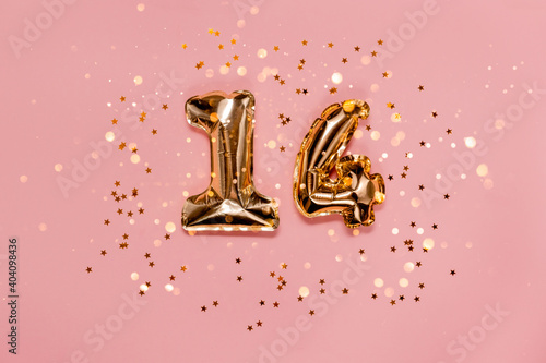 14 foil number saint valentine's day. Numbers with confetti and bokeh lights. Top horizontal view copyspace