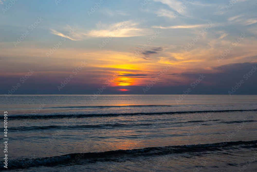 image of the sunrise on the sea in the early morning for nature background or new year concept with copy space image of the sunrise on the sea in the early morning for nature background or new year concept with copy space