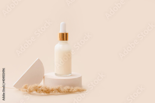 Trendy background with natural cosmetic skincare bottle. Product presentation. Beauty and body care product concept.