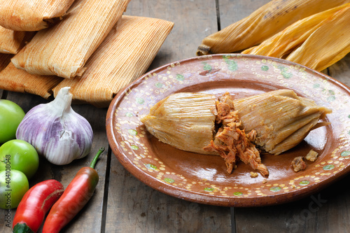 Tableau sur toile Tasty beef tamale on an artisan plate made of clay