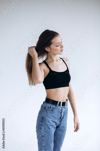 Stylish teen girl portrait. Young caucasian pretty beautiful slim girl isolated on white background © Andreshkova Nastya