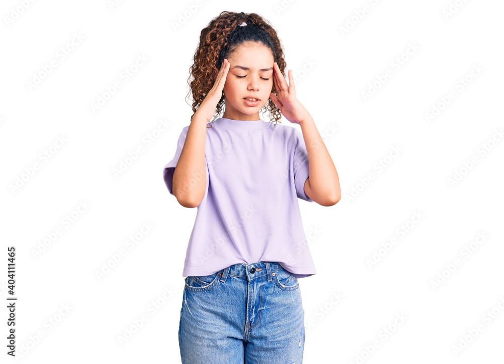 Beautiful kid girl with curly hair wearing casual clothes with hand on head for pain in head because stress. suffering migraine. Beautiful kid girl with curly hair wearing casual clothes with hand on head for pain in head because stress. suffering migraine.
