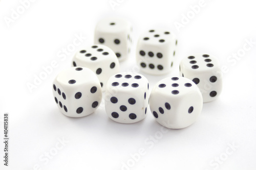 Set of white plastic dices isolated on white