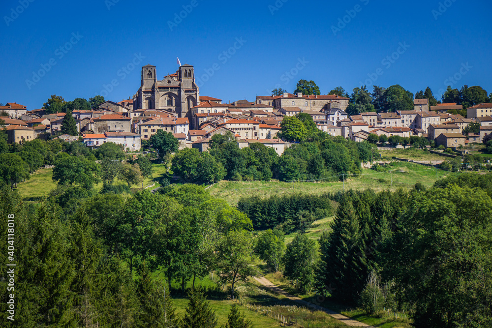 The small town of la Chaise Dieu in Auvergne, France. The imposing church is the abbey church of the 14th century