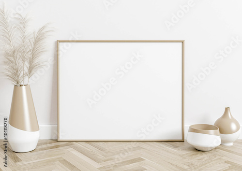 Horizontal 8x10 Frame Mockup. Horizontal wood frame on a wooden floor with decorations. Boho Style