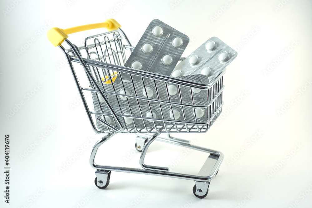 Pills in a shopping cart lose up. Pills in a shopping cart lose up.