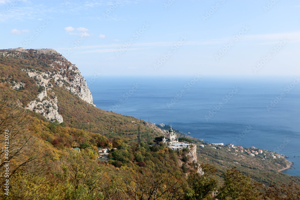Scenic autumn view from the top of the mountain Baydar gate to the Foros church and coastline of Black sea in Crimea Scenic autumn view from the top of the mountain Baydar gate to the Foros church and coastline of Black sea in Crimea