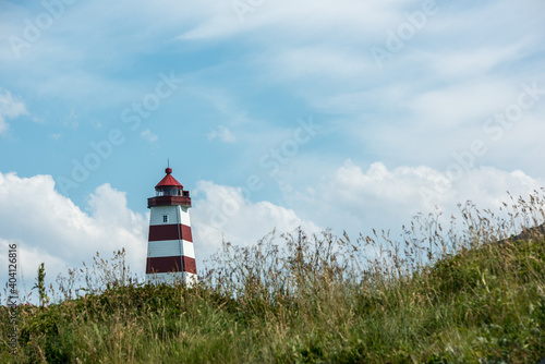 Alnes lighthouse on Godøya Island near Ålesund photo