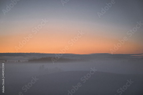 sunrise over the fields of toten  norway  in winter