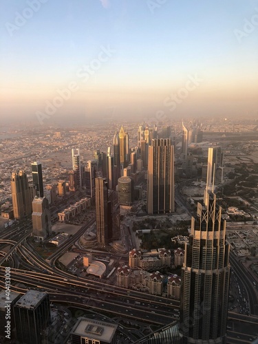 High Angle View Of Cityscape At Sunset Fotobehang