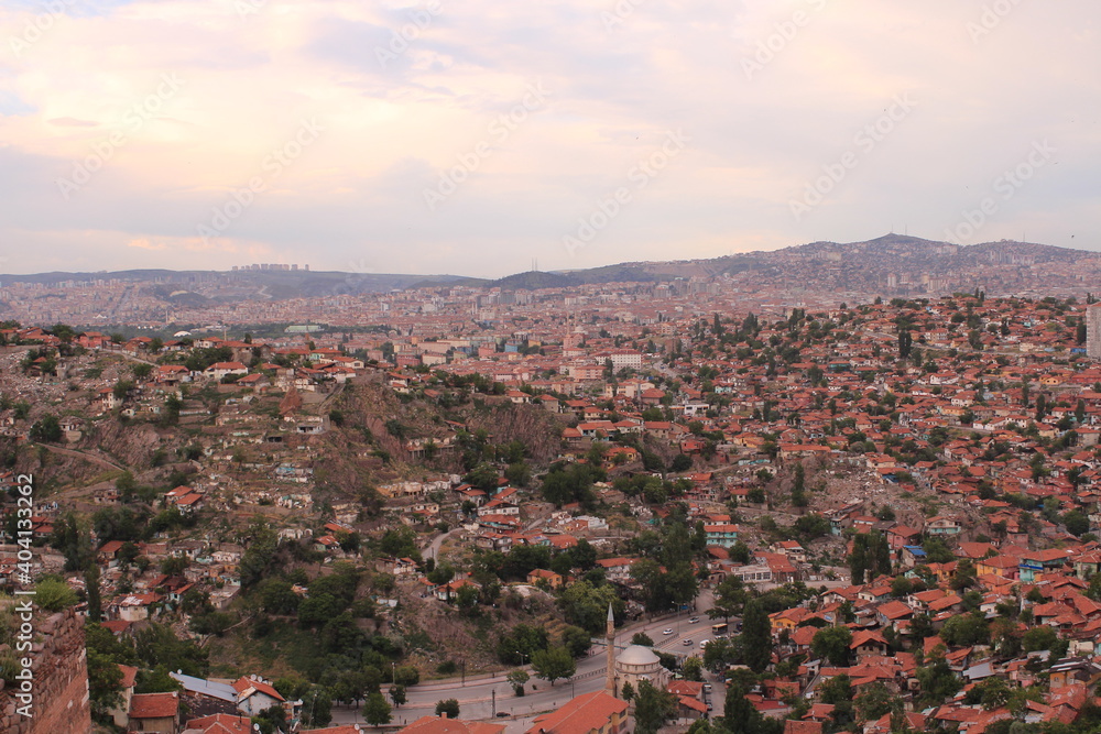 Panoramic view of unplanned urbanization and orange brick roof of buildings from Ankara the capital of Turkey