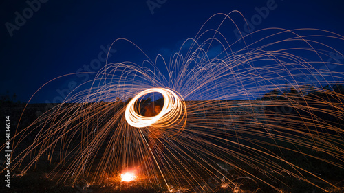 Photo of a man doing steel wool photography