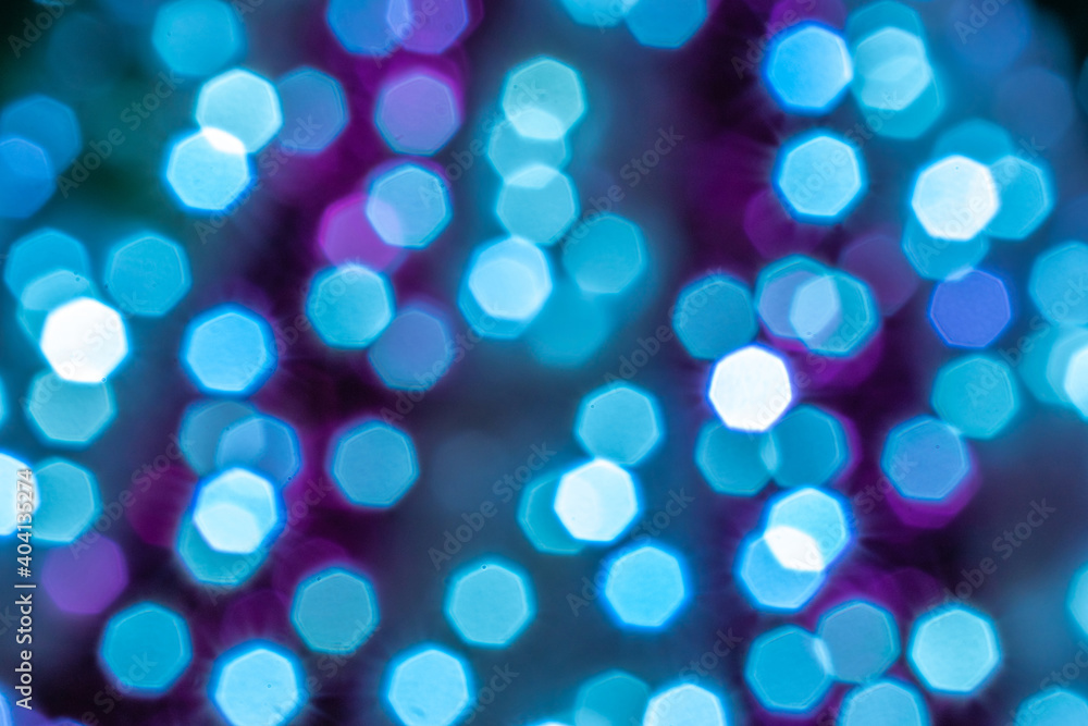 Bokeh background Blue glitter abstract lights. Festive blur. Defocused winter backdrop. Bokeh background Blue glitter abstract lights. Festive blur. Defocused winter backdrop.