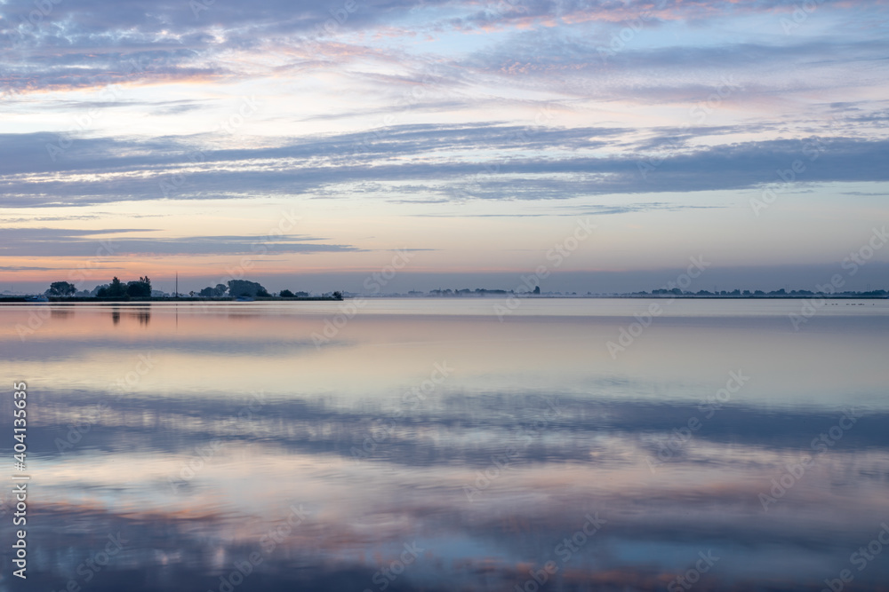 Sunrise over lake 't Joppe and the Kagerplassen in the South-Holland village of Warmond in the Netherlands.