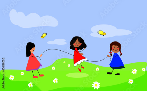 Happy three girls jump rope. In the background are the sky  grass  two butterflies and flowers