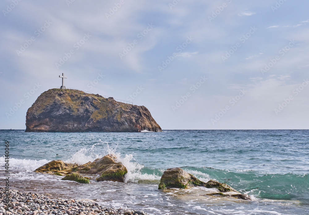 Rock of Holy Appearance or Georgievskaya from pebble beach Yashmovy Cape Fiolent in Balaklava district of Sevastopol Black Sea Crimea Peninsula Russia Rock of Holy Appearance or Georgievskaya from pebble beach Yashmovy Cape Fiolent in Balaklava district of Sevastopol Black Sea Crimea Peninsula Russia