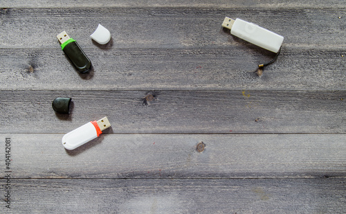 USB stick on the table. Photo of a flash drive on a wooden table