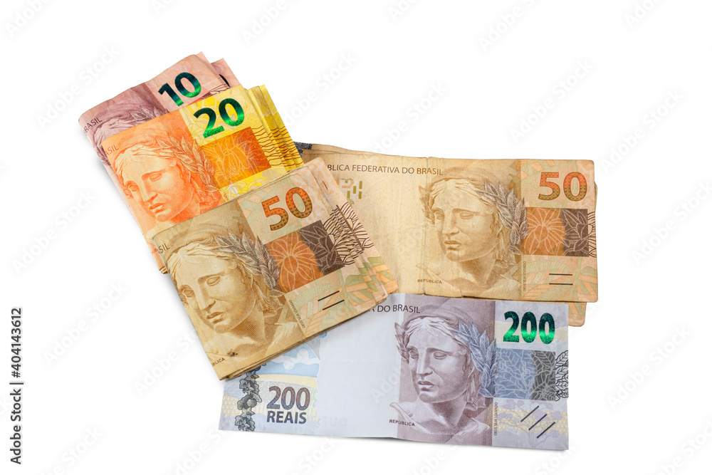 Brazilian money bill. Two hundred bill, ten, twenty, and fifty real bill. Top view. Brazilian money bill. Two hundred bill, ten, twenty, and fifty real bill. Top view.