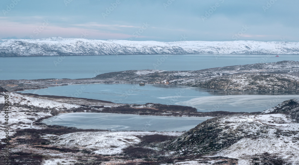 Arctic winter mountain hard-to-reach lakes. Northern wildlife. Kola Peninsula. Teriberka.