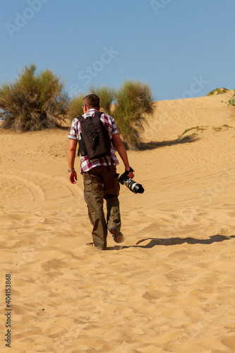 Photographer in the desert in the United Arab Emirates