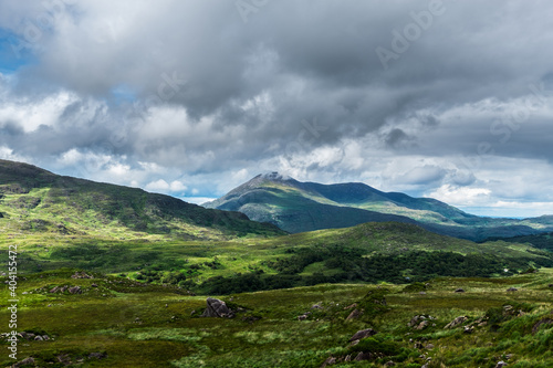 Clouds and green mountains, amazing nature of Ireland in Killarney National Park, near the town of Killarney, County Kerry 