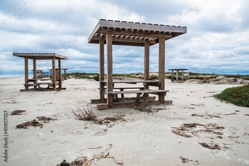 Fotografie Picnic Tables on a Beach on Padre Island, TX