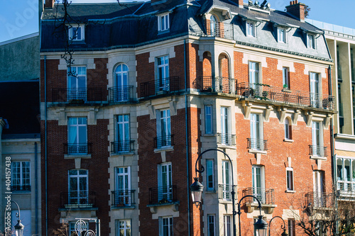 View of the facade of a historical building located in Reims, a city in the Grand Est region of France and one of the oldest in Europe