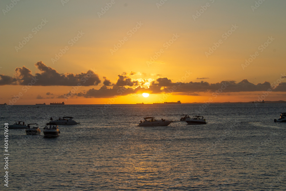   landscape of sunset with boats and ships on the background    