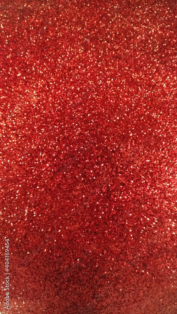 Red Christmas glitters, texture of Christmas decoration coating