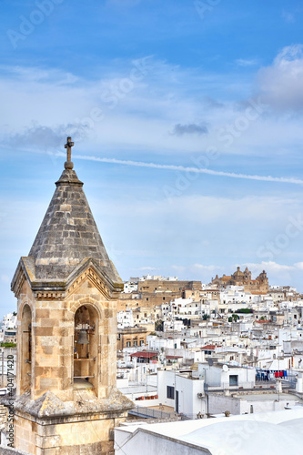 Принти на полотні View of the old white town of Ostuni and the cathedral at sunrise