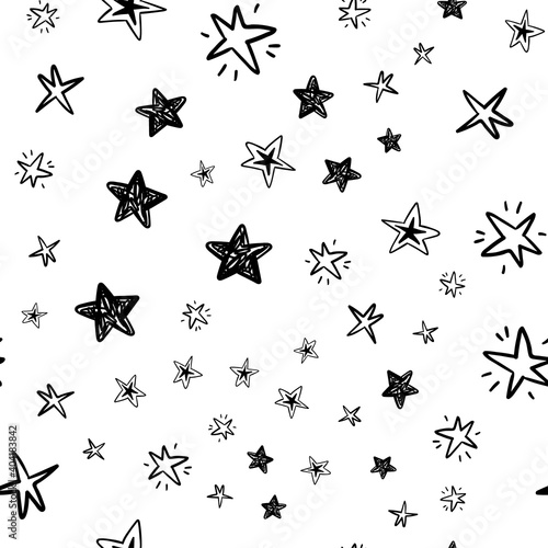 hand drawn stars seamless pattern. Doodle star texture. Sky and night background.