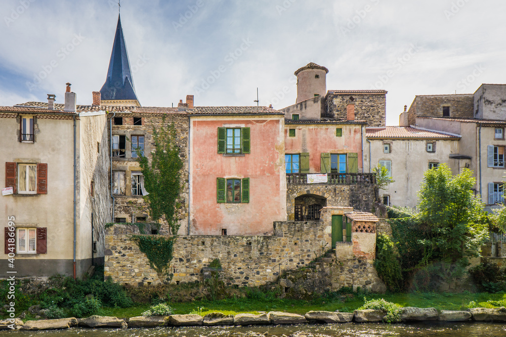 Houses on the riverbanks in the small town of Champeix, Auvergne (France)
