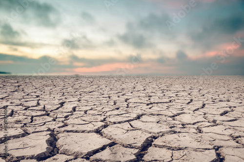 Landscape ground cracks drought crisis environment.