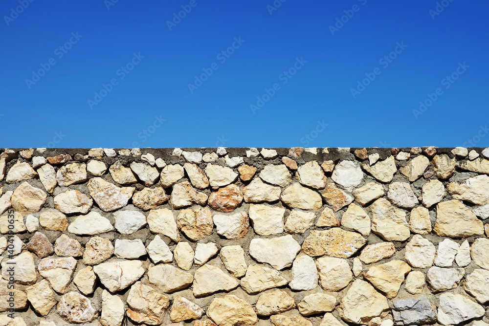 old fashioned rock wall with large rocks close up of rock wall close up of detailed rough surface , which ideal for use in the design