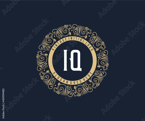 Initial IQ Antique retro luxury victorian calligraphic emblem logo with ornamental frame.