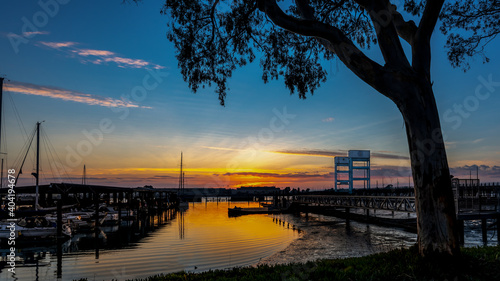 View of a beautiful sunset in the background of Mare Island seen from the Vallejo, Ca. marina 