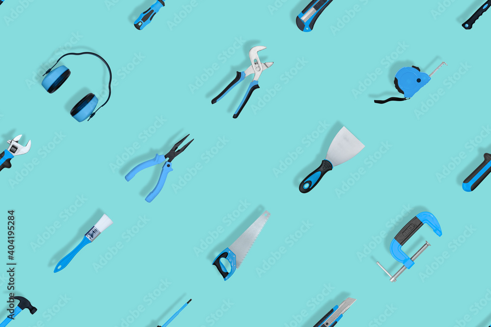 Tools seamless pattern. Various construction tools on an aquamarine background. Tools seamless pattern. Various construction tools on an aquamarine background.