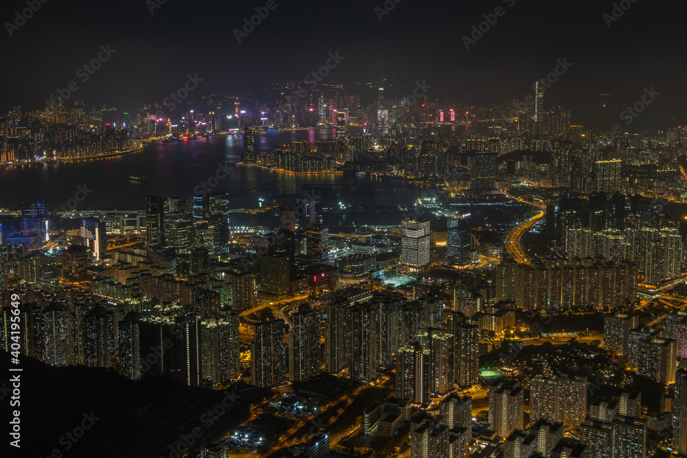 Victoria Harbour as seen from the top of Kowloon peak with Hong Kong Island and Kowloon skyline visible in the distance
