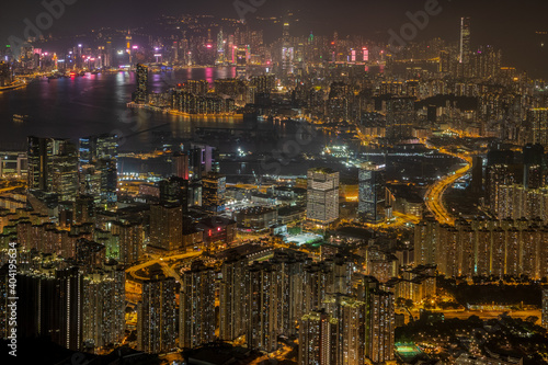 Victoria Harbour with Hong Kong Island and Kowloon visible from above the night hike to the top of Kowloon peak