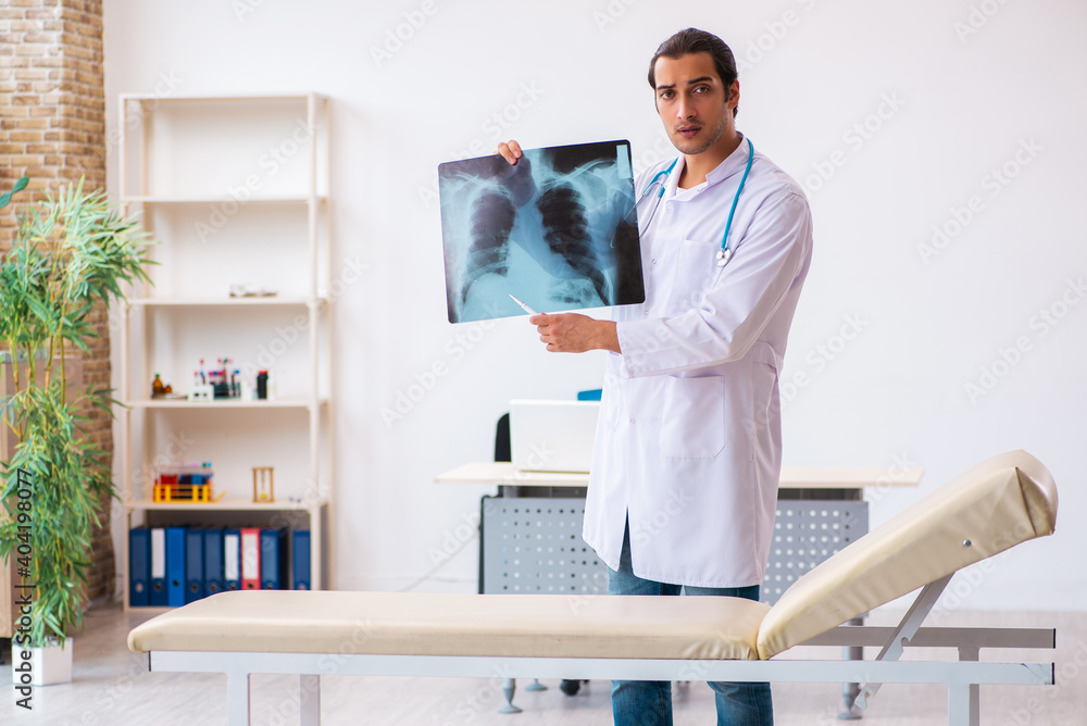 Young male doctor radiologist working in the clinic
