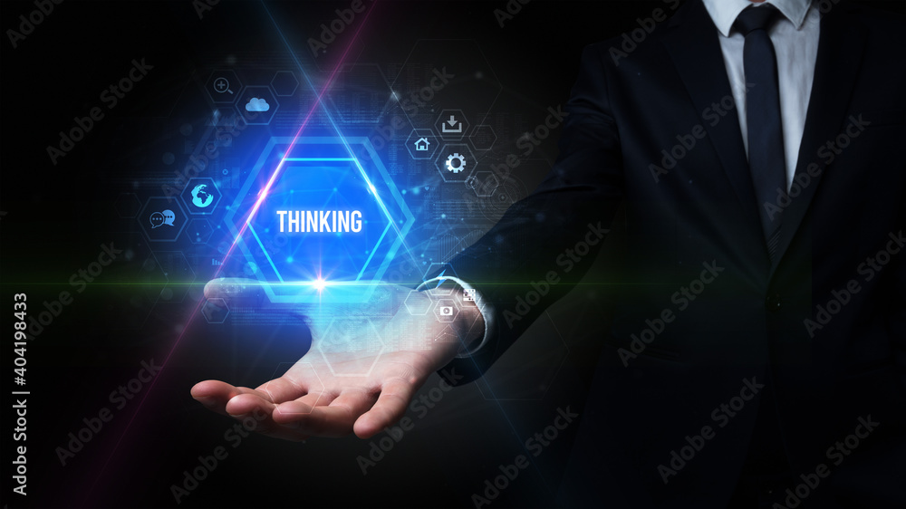 Naklejka premium Man hand holding THINKING inscription, social media concept