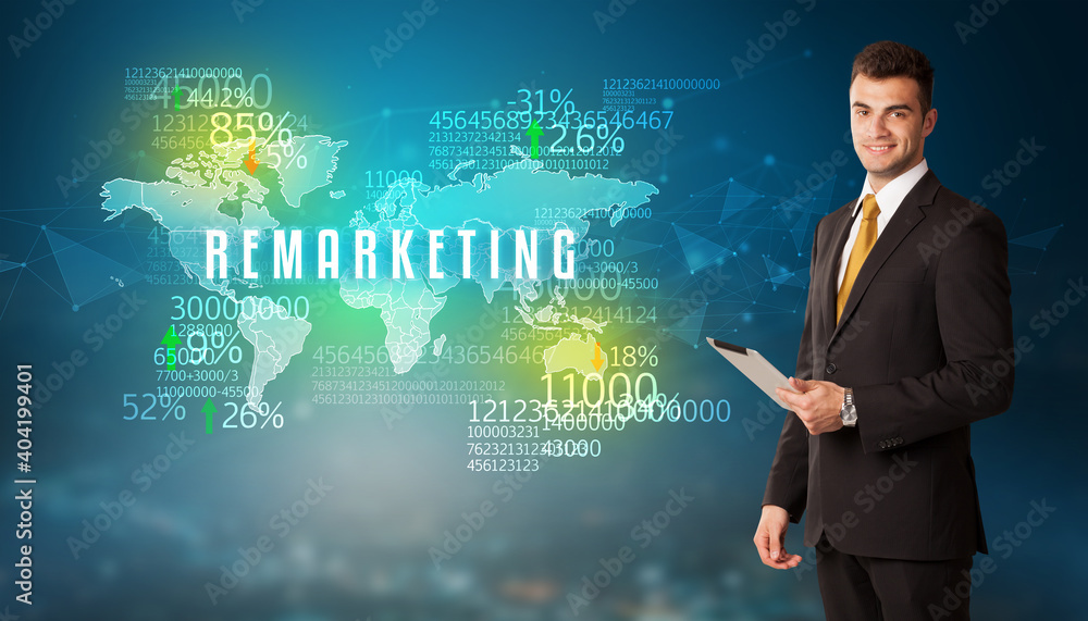 Businessman in front of a decision with REMARKETING inscription, business concept Businessman in front of a decision with REMARKETING inscription, business concept