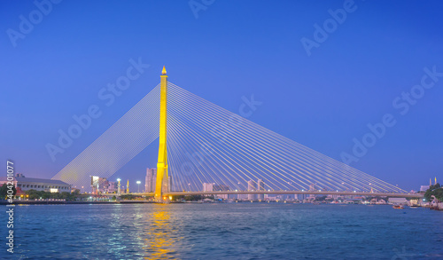 Rama VIII Suspension Bridge by the Chao Praya River at sunset in Bangkok Thailand, one of Bankok, Thailand landmark