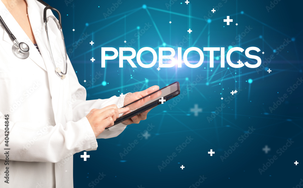 Doctor fills out medical record with PROBIOTICS inscription, medical concept Doctor fills out medical record with PROBIOTICS inscription, medical concept