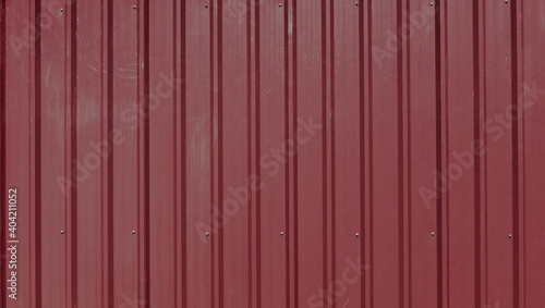 Outdoor temporary corrugated dark red wall partition