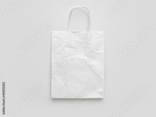 paper bag with small isolated on white background. Mockup for design