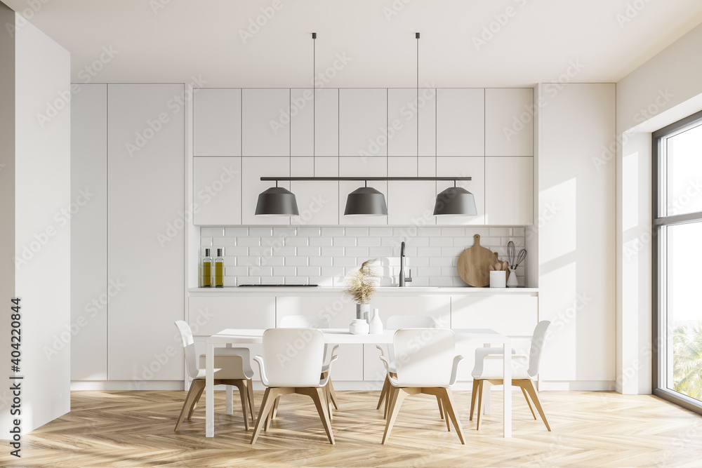 White kitchen interior with table